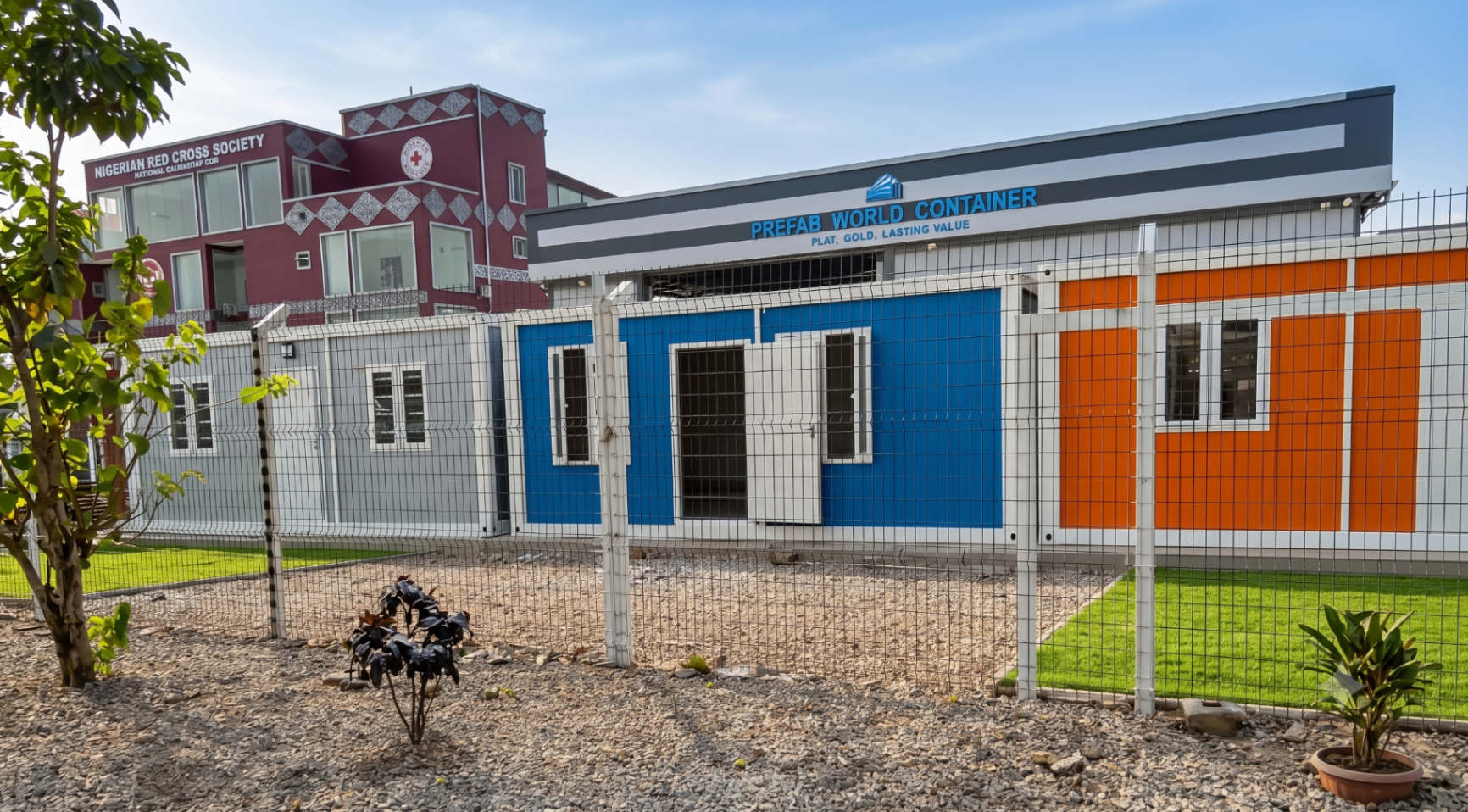 Prefab World showroom frontage with branded modular units